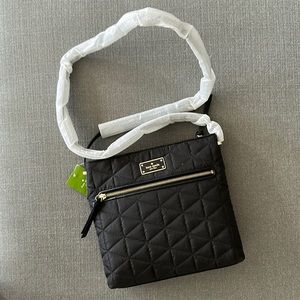 Tags on Kate Spade quilted crossbody bag